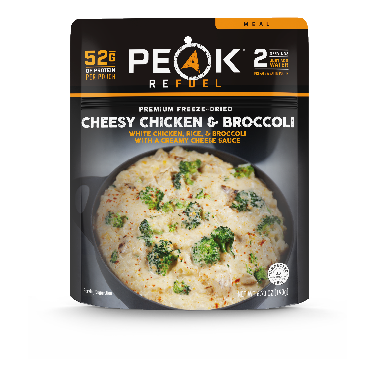 A package of frozen food with a bowl of broccoli, perfect for a quick and easy meal.